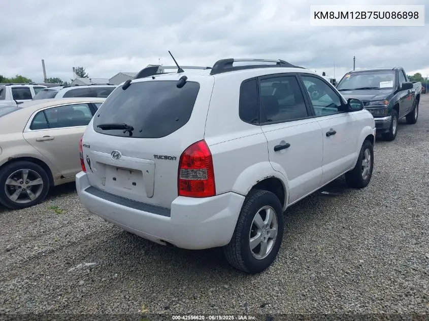 2005 Hyundai Tucson Gl VIN: KM8JM12B75U086898 Lot: 42556620