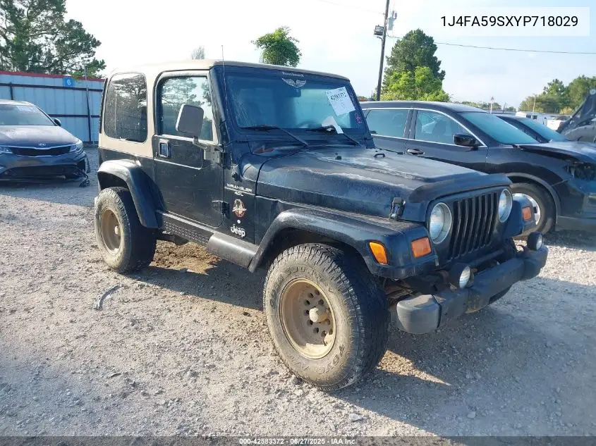 2000 Jeep Wrangler Sahara VIN: 1J4FA59SXYP718029 Lot: 42583372