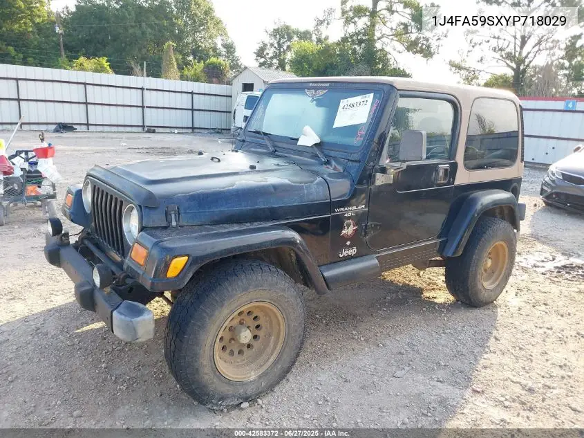 2000 Jeep Wrangler Sahara VIN: 1J4FA59SXYP718029 Lot: 42583372