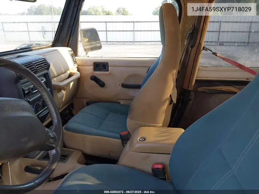 2000 Jeep Wrangler Sahara VIN: 1J4FA59SXYP718029 Lot: 42583372
