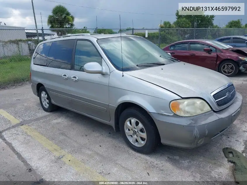 2004 Kia Sedona Ex/Lx VIN: KNDUP131X46597992 Lot: 42539080