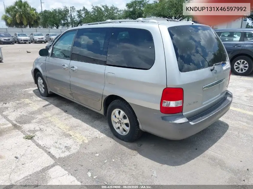 2004 Kia Sedona Ex/Lx VIN: KNDUP131X46597992 Lot: 42539080