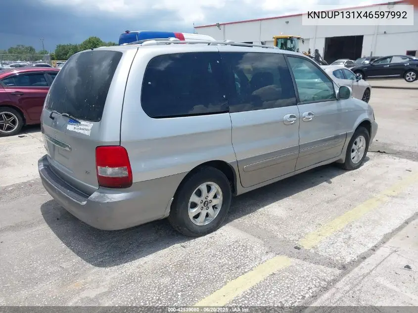 2004 Kia Sedona Ex/Lx VIN: KNDUP131X46597992 Lot: 42539080