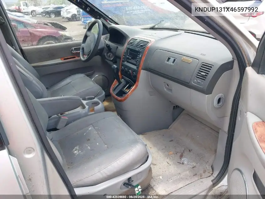 2004 Kia Sedona Ex/Lx VIN: KNDUP131X46597992 Lot: 42539080