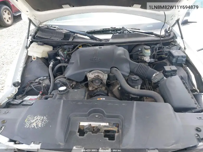 2001 Lincoln Continental VIN: 1LN8M82W11Y694879 Lot: 42313003