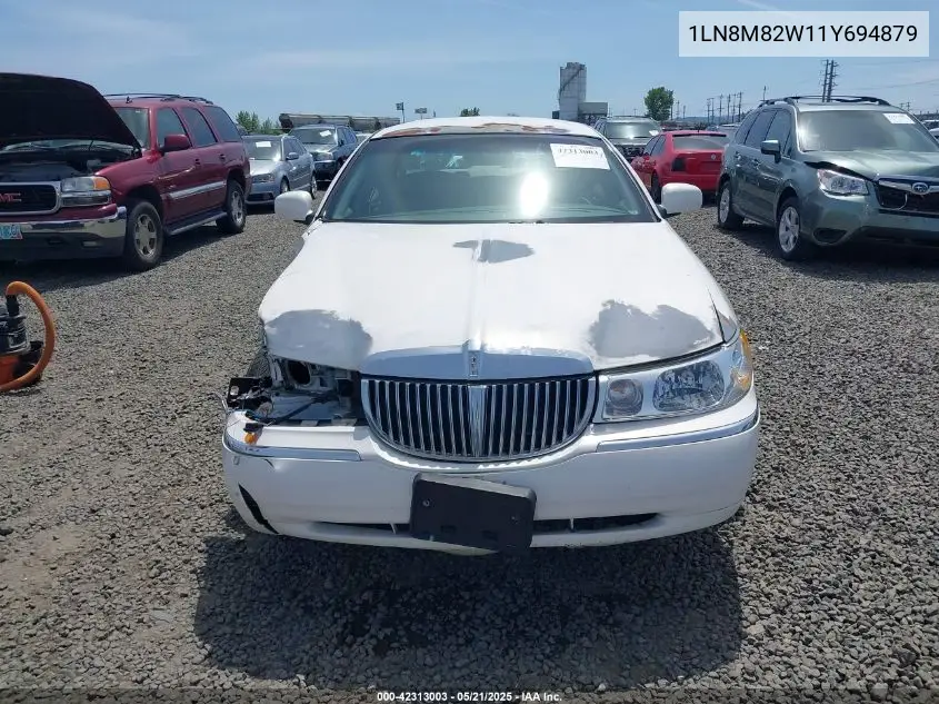 2001 Lincoln Continental VIN: 1LN8M82W11Y694879 Lot: 42313003
