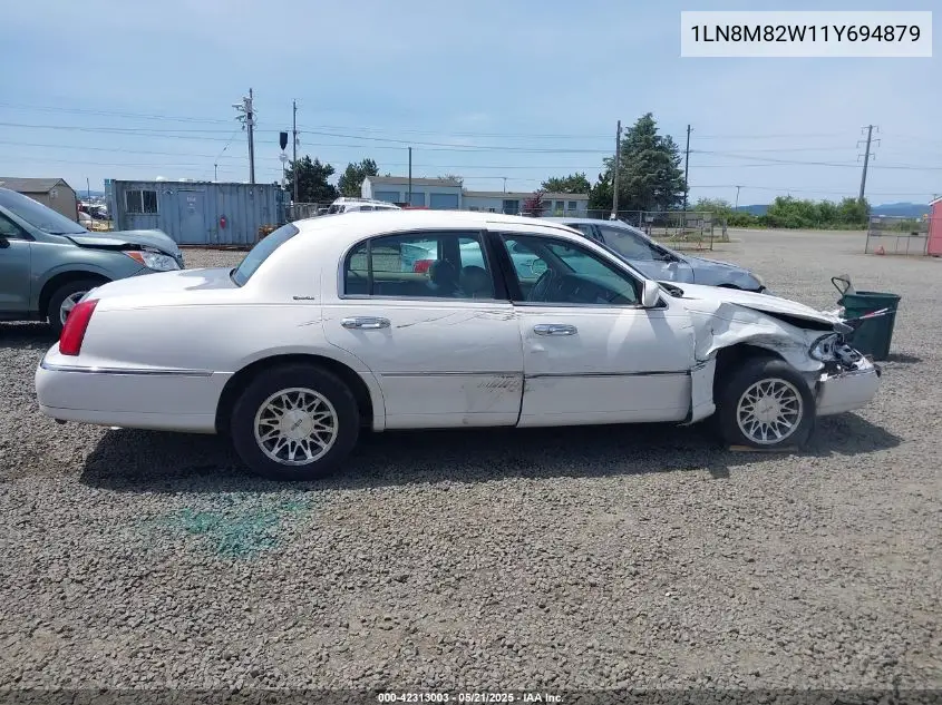 2001 Lincoln Continental VIN: 1LN8M82W11Y694879 Lot: 42313003