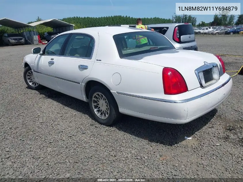 2001 Lincoln Continental VIN: 1LN8M82W11Y694879 Lot: 42313003