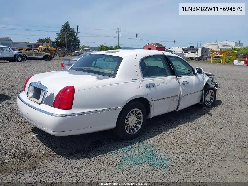 2001 Lincoln Continental VIN: 1LN8M82W11Y694879 Lot: 42313003