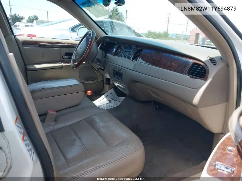 2001 Lincoln Continental VIN: 1LN8M82W11Y694879 Lot: 42313003