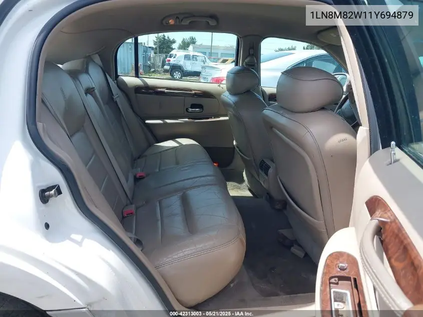 2001 Lincoln Continental VIN: 1LN8M82W11Y694879 Lot: 42313003