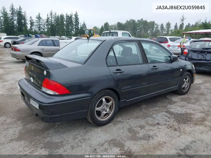 2002 Mitsubishi Lancer Oz Rally VIN: JA3AJ86EX2U059845 Lot: 42371709