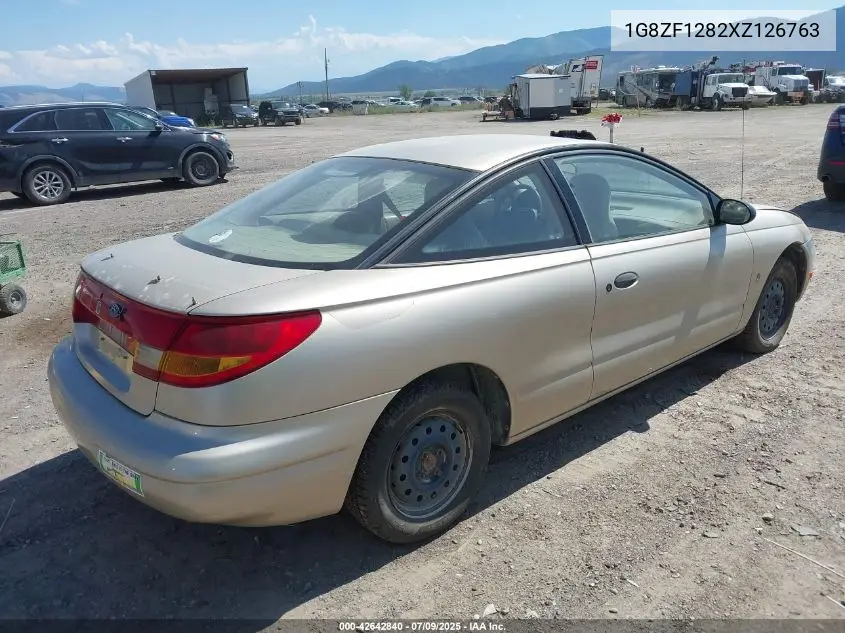 1999 Saturn Sc1 VIN: 1G8ZF1282XZ126763 Lot: 42642840