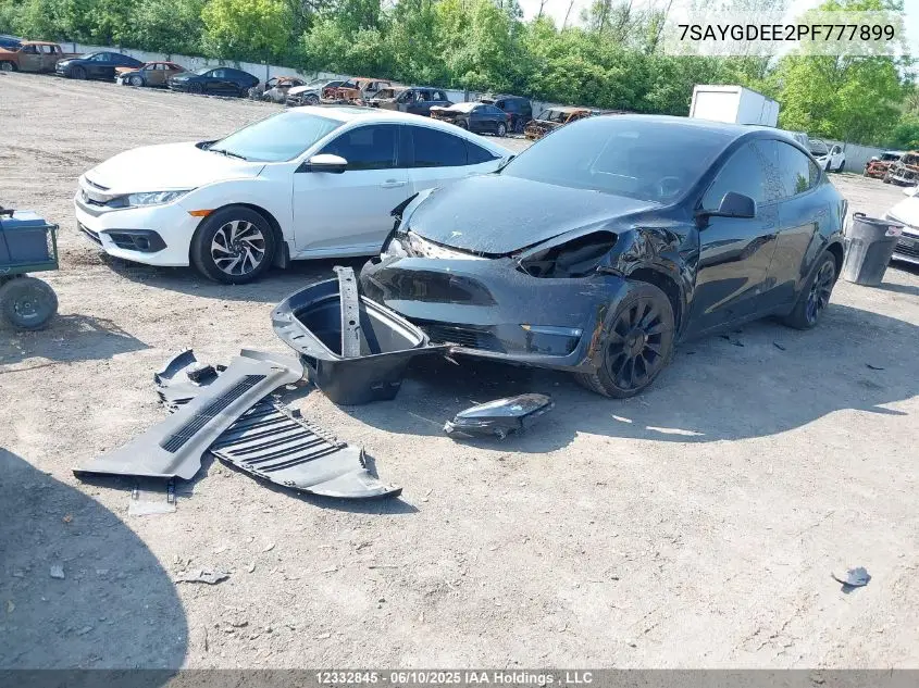 2023 Tesla Model Y VIN: 7SAYGDEE2PF777899 Lot: 12332845
