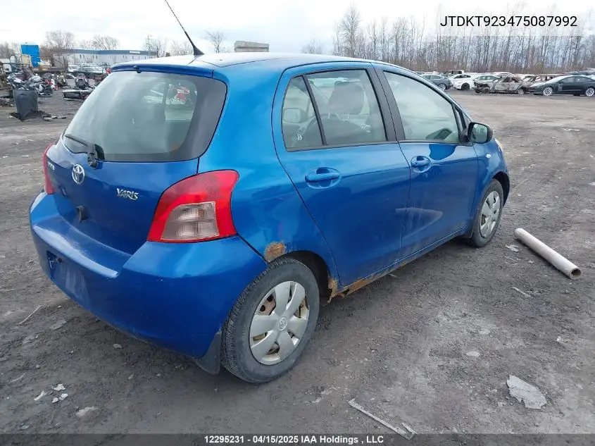 2007 Toyota Yaris VIN: JTDKT923475087992 Lot: 12295231