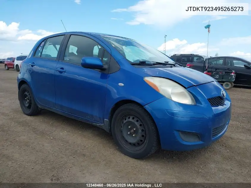2009 Toyota Yaris VIN: JTDKT923495265273 Lot: 12348460