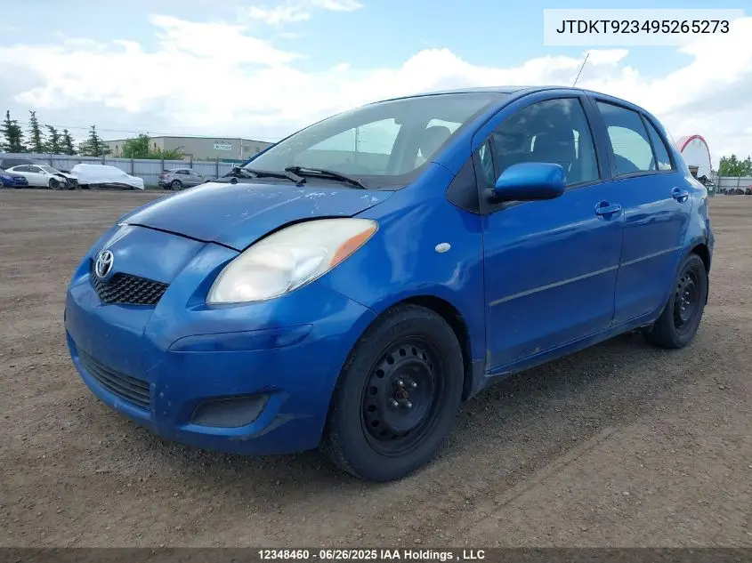 2009 Toyota Yaris VIN: JTDKT923495265273 Lot: 12348460