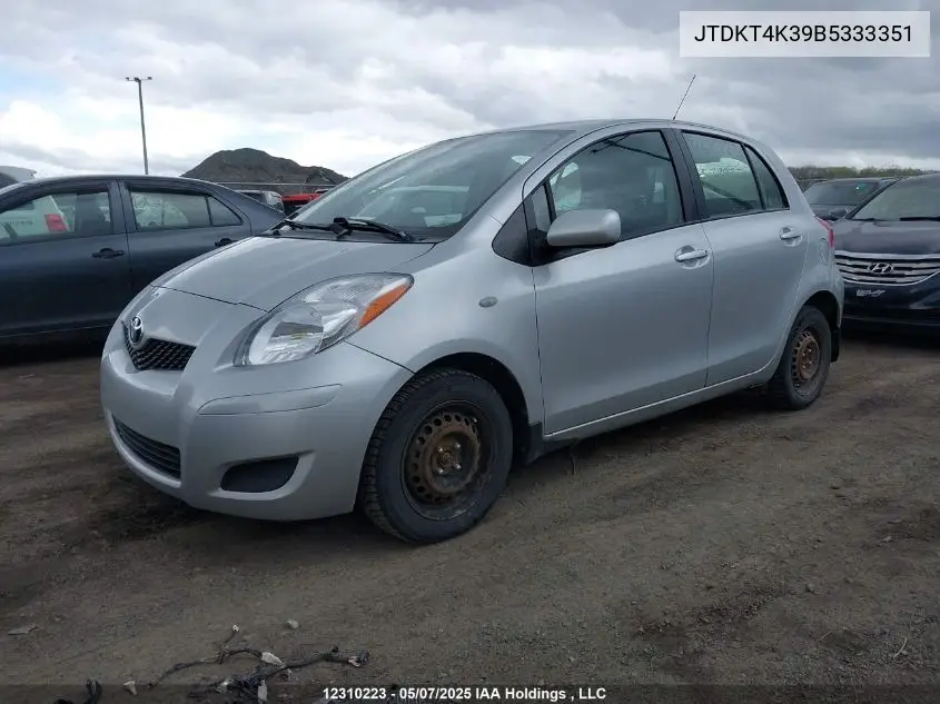 2011 Toyota Yaris Le VIN: JTDKT4K39B5333351 Lot: 12310223X