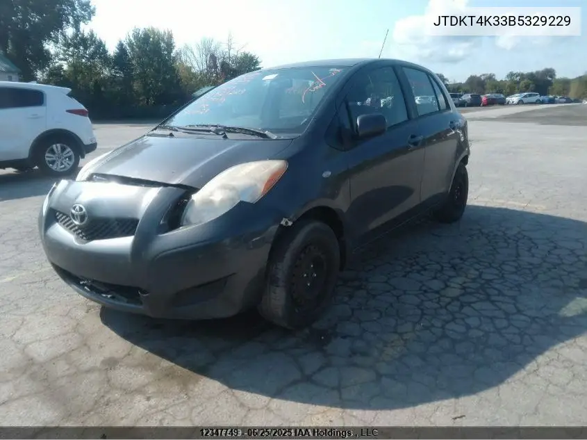 2011 Toyota Yaris VIN: JTDKT4K33B5329229 Lot: 12347749